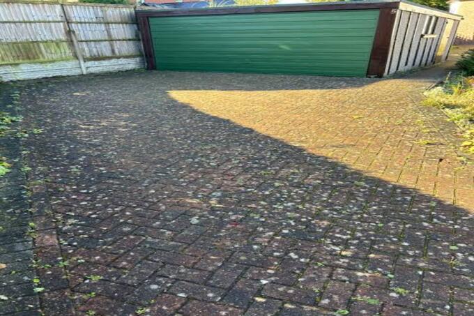 Driveway before professional cleaning
