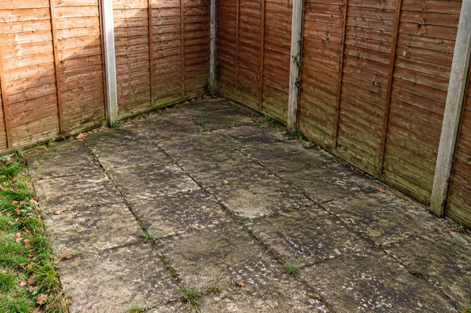 Patio before professional cleaning